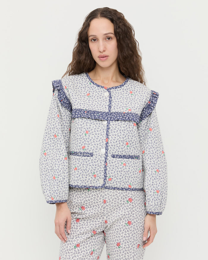 Winslet Jacket in blue floral cotton and Pasha Trouser in white floral cotton-linen.